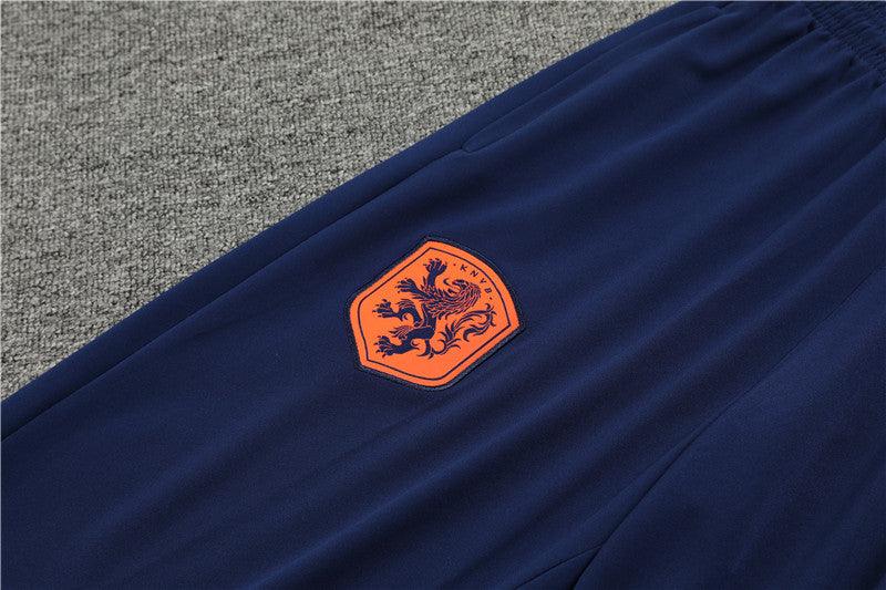 Conjunto Treino Holanda 24/25 - Versão Jogador - Laranja e azul marinho