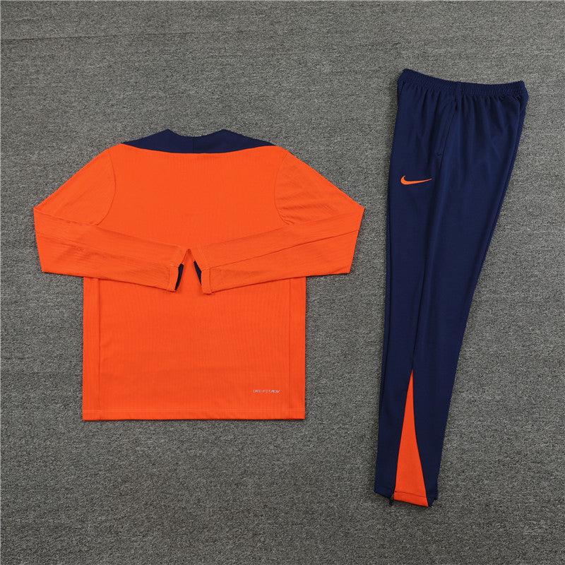 Conjunto Treino Holanda 24/25 - Versão Jogador - Laranja e azul marinho