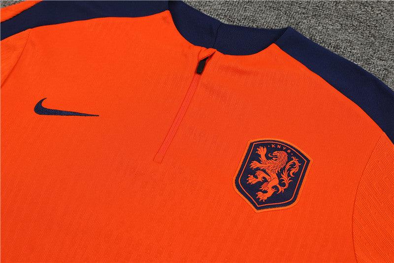 Conjunto Treino Holanda 24/25 - Versão Jogador - Laranja e azul marinho